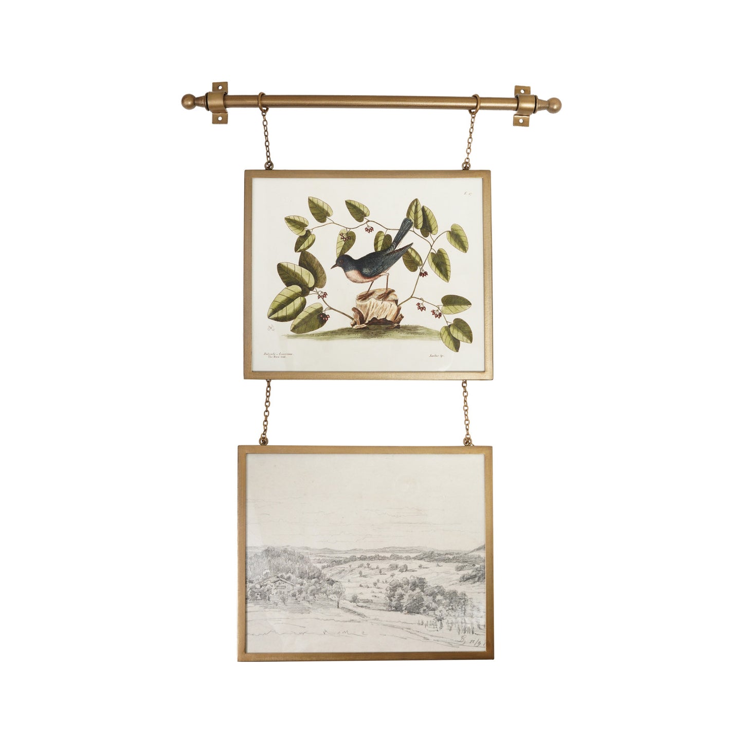A brass double-hanging wall tapestry with two framed vintage bird and landscape prints suspended from a brass rod against a white background.