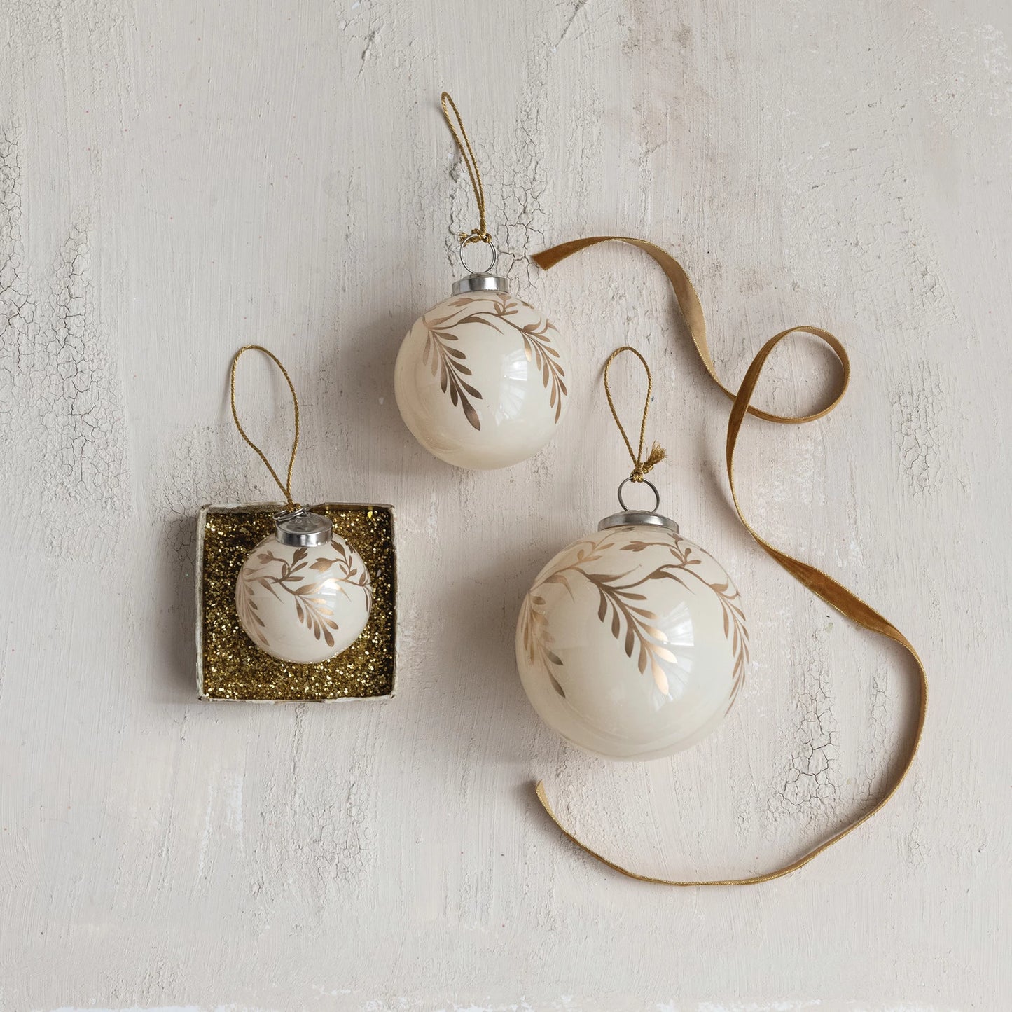 Cream Glass Ornament With Gold Vine