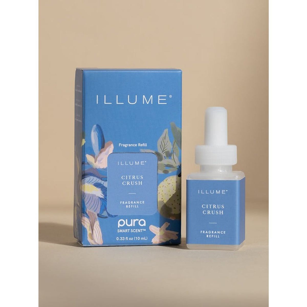 Illume Citrus Crush fragrance refill bottle and packaging on a beige background