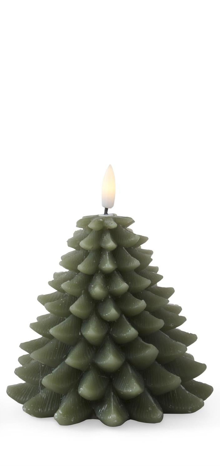 A no flame lit Christmas tree-shaped candle in olive green wax, photographed against a clean white background.