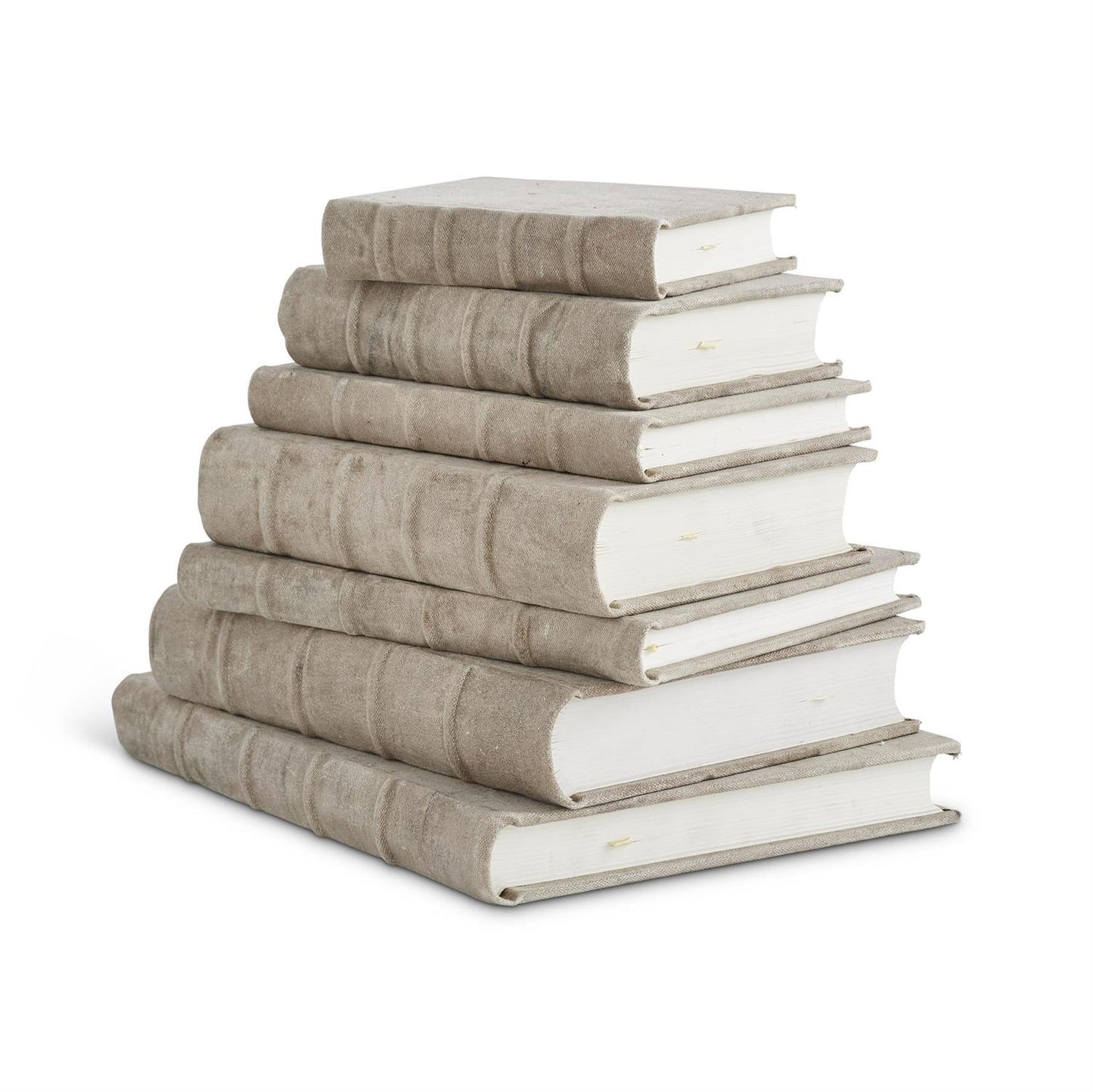 Stack of books with textured covers on a white background