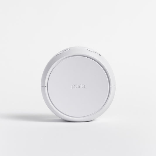 White Pura fragrance device with white background